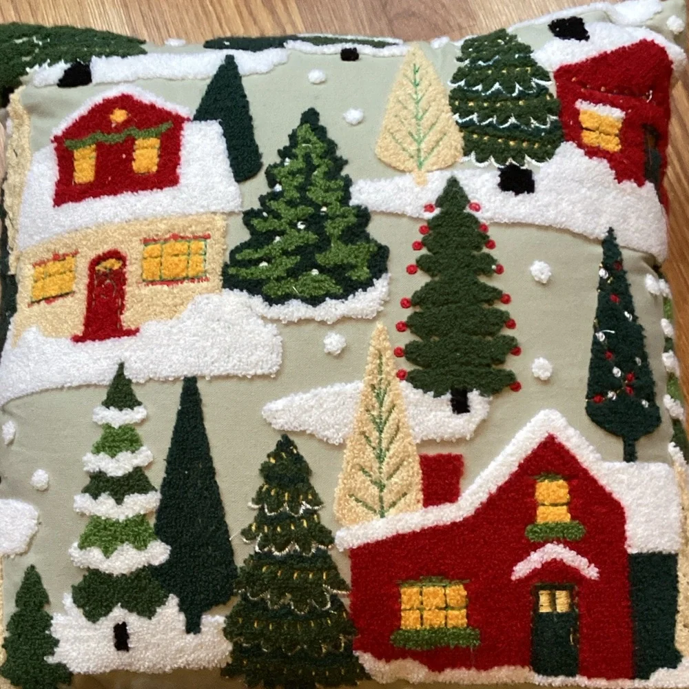 Cozy Holiday Village Pillow with Red and Green Design